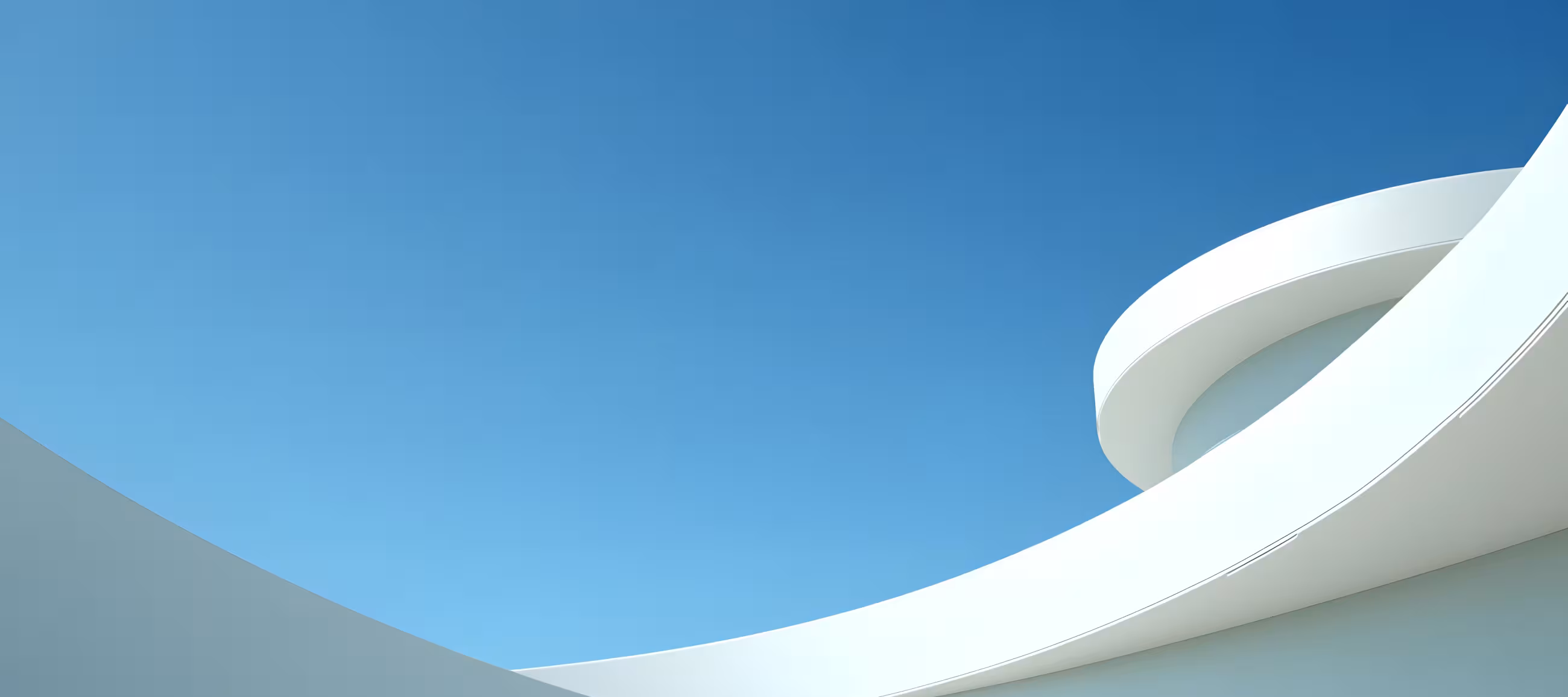 woah! A white curve that looks like a wave on a building. Or just a wall. Or perhaps a cool angle on a plate and a cup, from inside the plate. You get it.